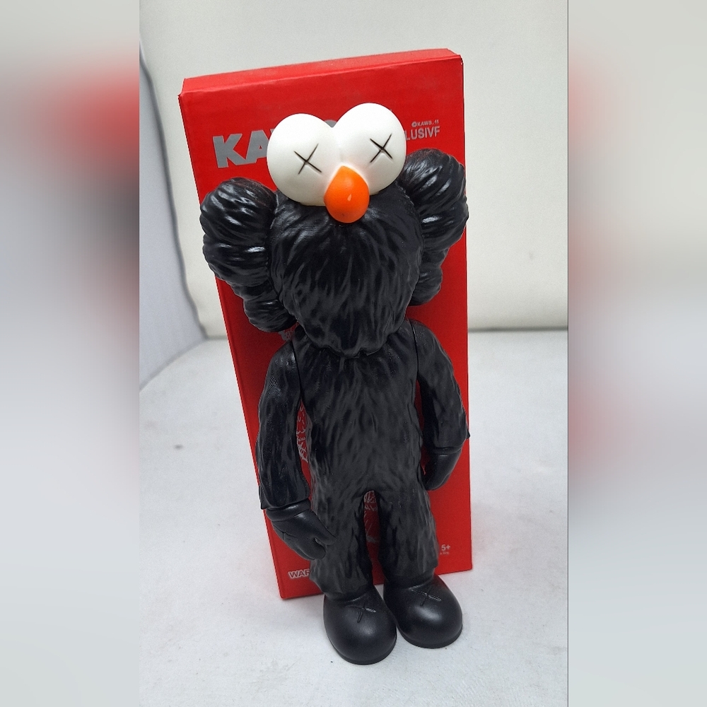 KAWS Black and Orange Action Figure